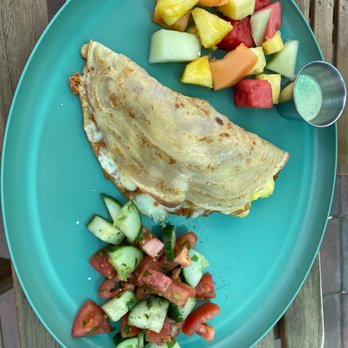 MAKE Cafe - Somali Malawah with fruit and tomato and cucumber salad - Breakfast & Brunch Near Me - San Diego, California MAKE Cafe - Somali Malawah with fruit and tomato and cucumber salad - Breakfast & Brunch Near Me - San Diego, California