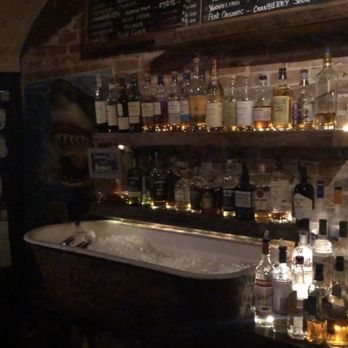 Judy & Punch - Beer cans in a bathtub - Cocktail Bars Near Me - Astoria, New York