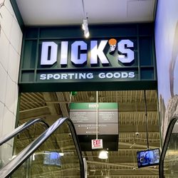 DICK'S Sporting Goods - Entrance is up the escalator.