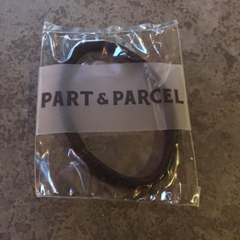 Part & Parcel - Complimentary hair ties for the ladies (and men!) when the wind picks up. Classy touch! - Cocktail Bars Near Me - Houston, Texas
