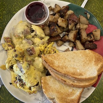 Ruth's Cafe - Custom scramble with brisket, mushrooms and Swiss; sourdough bread with house made jam; home fries $12.50 - Breakfast & Brunch Near Me - Indianapolis, Indiana