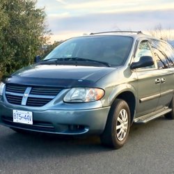 Island Rent A Car - Dodge Caravan | Seats 7 | 2 Large + 2 Small Suitcases