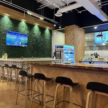 Tikka Shack Indian Grub - Dining area with big screen tv. - Indian Near Me - Phoenix, Arizona