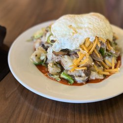 The Shop - Duck Hash:  Duck confit, potatoes, brussel sprouts, mushrooms, red chile, cheese and eggs your way. Oh my.