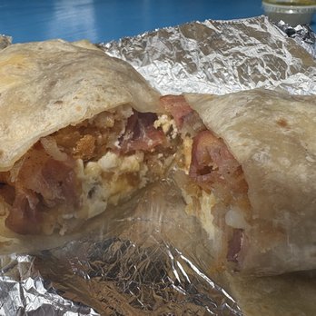 The Country Kitchen - Sausage, Bacon, Egg, Potato, and Cheese Breakfast Burrito. - Burgers Near Me - Malibu, California The Country Kitchen - Sausage, Bacon, Egg, Potato, and Cheese Breakfast Burrito. - Burgers Near Me - Malibu, California
