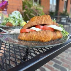 Nomada Bakery - Caprese croissant sandwich.