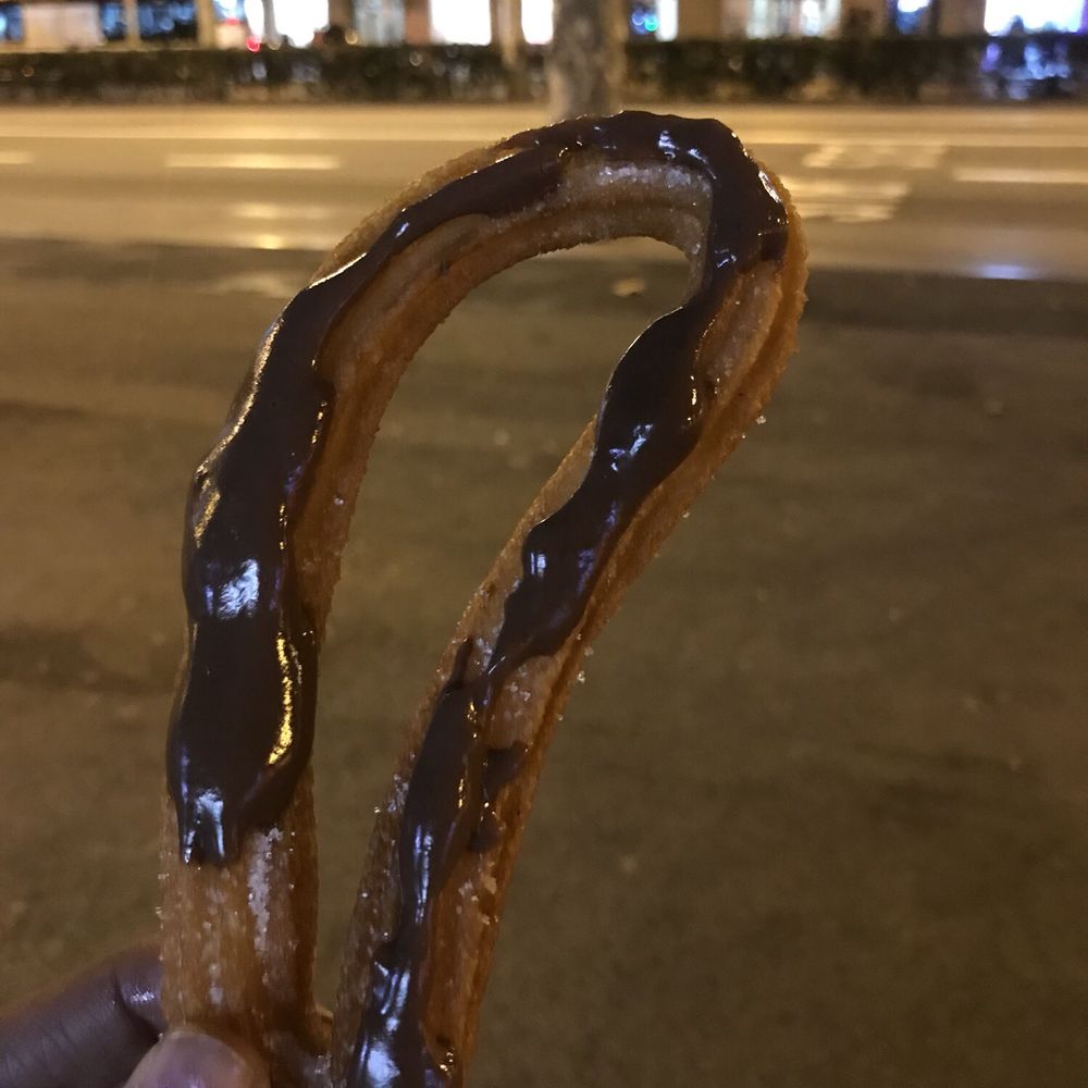 Xurreria - Hot churro covered in melted chocolate - Desserts Near Me - Barcelona, B