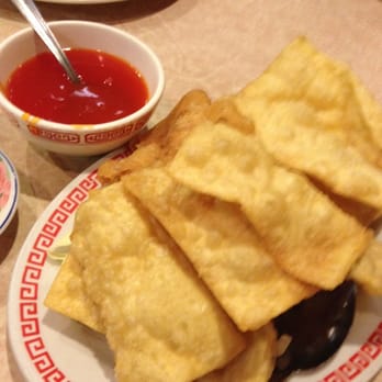 Wan Lung Chinese - Fried wontons and sweet and sour dipping sauce. - Chinese Near Me - Clackamas, Oregon Wan Lung Chinese - Fried wontons and sweet and sour dipping sauce. - Chinese Near Me - Clackamas, Oregon