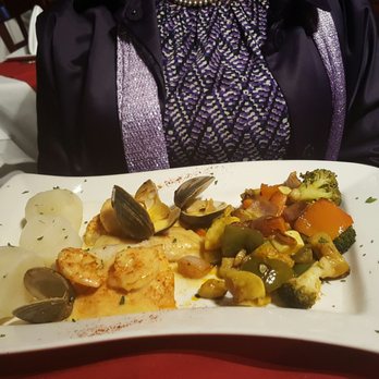 VIVO Tapas KITCHEN LOUNGE - My boss' seafood platter. She ate it and was satisfied even without touching the potatos. #TeamNoStarch - Spanish Near Me - Newark, New Jersey