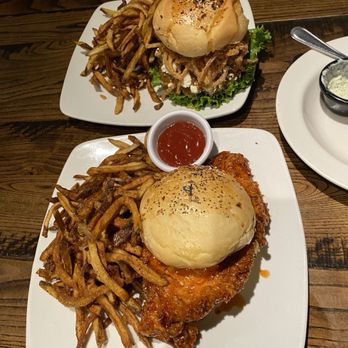 Local Goat - Spicy chicken sandwich and the goat cheese burger with fried onions - New American Near Me - Pigeon Forge, Tennessee