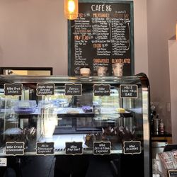 Cafe 86 - Treat refrigerator and menus.