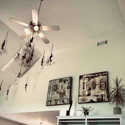 The Acadian Wine Company - Bundles of dried flowers and local art (available for purchase) can be seen around the room