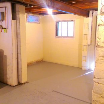 Painting Plus - This stone foundation and floor repainted after a bathroom flood from a toilet supply line. - Painters Near Me - Essex, Connecticut Painting Plus - This stone foundation and floor repainted after a bathroom flood from a toilet supply line. - Painters Near Me - Essex, Connecticut