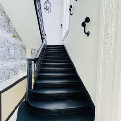 Distinctive Floors - From concept to reality: White Oak staircase in water‑based black paint. In progress, with final details perfected to our standards.