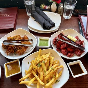 Haldi Indian Cuisine - Vegetable Pakora, Chicken 65, and Masala French fries - Indian Near Me - Surprise, Arizona