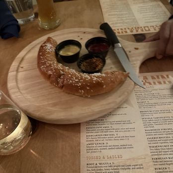 Waldmann Brewery - Half eaten pretzel with 3 mustards, full pint beer - Breweries Near Me - Saint Paul, Minnesota Waldmann Brewery - Half eaten pretzel with 3 mustards, full pint beer - Breweries Near Me - Saint Paul, Minnesota