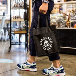 Assorted Table Wine & Shop - Receive a complimentary wine tote when you purchase four or more bottles. Strut in style.