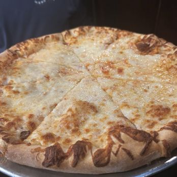 Mario's Ristorante - Large extra cheese pizza - Italian Near Me - Galveston, Texas