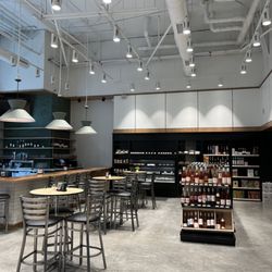 Uncorked Chevy Chase - Bar seating with small bites provided by Opal Restaurant.