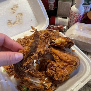 Hong Kong 1 - a person grabbing a piece of fried chicken from a styrofoam container - Chinese Near Me - Monroe, North Carolina Hong Kong 1 - a person grabbing a piece of fried chicken from a styrofoam container - Chinese Near Me - Monroe, North Carolina