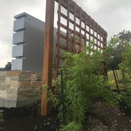 Trellis 14' X9' Trellis behind commercial monument sign. Trellis 14' X9' Trellis behind commercial monument sign.