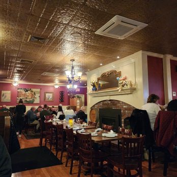 Gerardi's Cafe - people sitting at tables in a restaurant - Italian Near Me - South Yarmouth, Massachusetts Gerardi's Cafe - people sitting at tables in a restaurant - Italian Near Me - South Yarmouth, Massachusetts