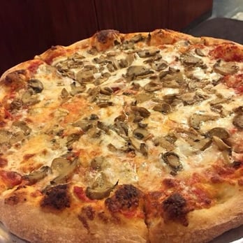 Amici's Pizza Cafe - Large mushroom pizza. - Italian Near Me - Coconut Creek, Florida Amici's Pizza Cafe - Large mushroom pizza. - Italian Near Me - Coconut Creek, Florida