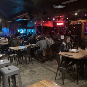 Clock-Out Lounge - a group of people sitting at tables - Bars Near Me - Seattle, Washington Clock-Out Lounge - a group of people sitting at tables - Bars Near Me - Seattle, Washington