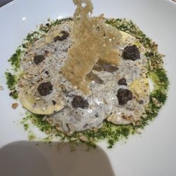 Poggetti - Sheep cheese stuffed Ravioli with truffle pesto and hazelnut pieces