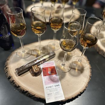 Corona Cigar Company & J.C. Newman Diamond Crown Lounge - several glasses of wine and a cigar - Whiskey Bars Near Me - Tampa, Florida Corona Cigar Company & J.C. Newman Diamond Crown Lounge - several glasses of wine and a cigar - Whiskey Bars Near Me - Tampa, Florida