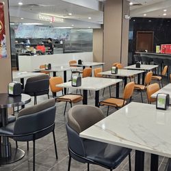 Dumpling District - Seating area and empty bar space for now