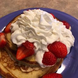 Pancakes with strawberries and whipped cream! Very good!