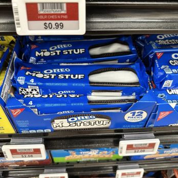 Buc-ee's - The image shows several packages of Oreo Most Stuf cookies arranged on a store shelf. The packages are blue with the Oreo logo and product name clearly visible. Price tags are attached to the shelf, indicating prices of $0.99 and $2.08. The shelf appears to be part of a grocery store's snack aisle, with other snack products partially visible around the Oreo packages. - Car Wash Near Me - Cypress, Texas