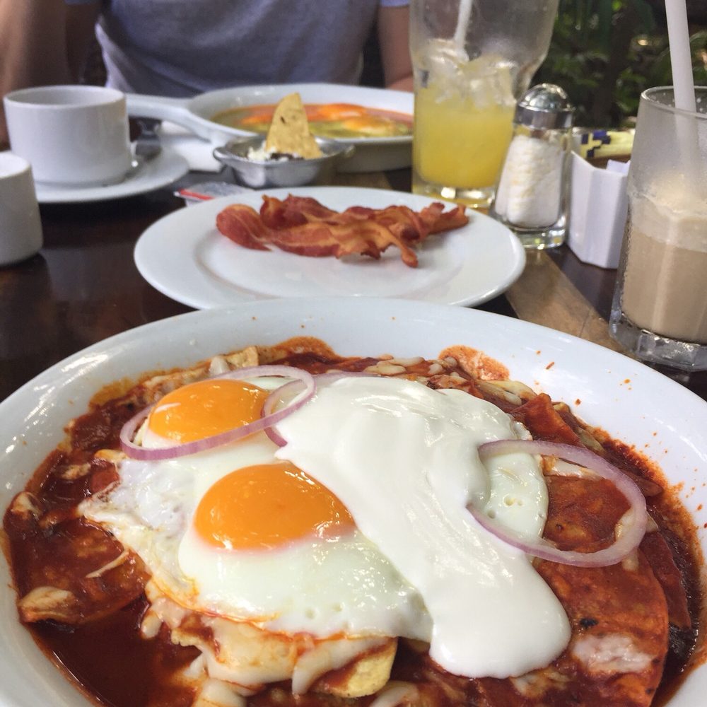 Aldea Corazón - Chilaquiles with eggs and ranchero eggs in back. Get these! - Mexican Near Me - Quintana Roo, ROO