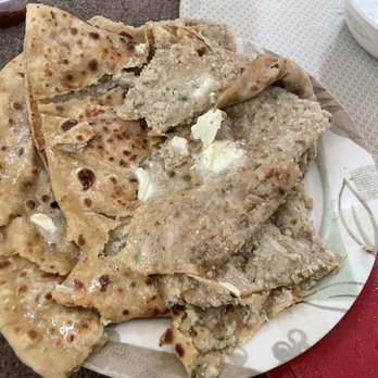 Punjabi Dhaba - Gobi parontha layers w melting butter on top - Indian Near Me - Fresno, California Punjabi Dhaba - Gobi parontha layers w melting butter on top - Indian Near Me - Fresno, California