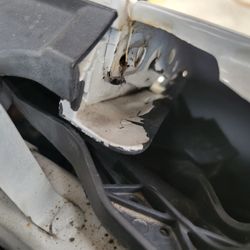 AAMCO Transmissions & Total Car Care - missing bolt to hold on left side bumper