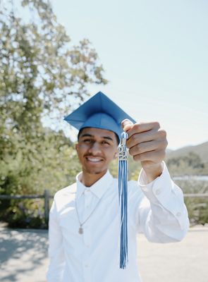 Graduation - We provide flexibility and accommodating sessions for everyone because we understand things come up and want you in the best space to capture genuine moments. Get a unique style and vintage aesthetic that'll age with grace. Text or message us for info on 30 min sessions or longer!