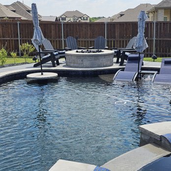 Texas Outdoor Oasis - pool with chairs and umbrellas - Landscaping Near Me - Wylie, Texas Texas Outdoor Oasis - pool with chairs and umbrellas - Landscaping Near Me - Wylie, Texas