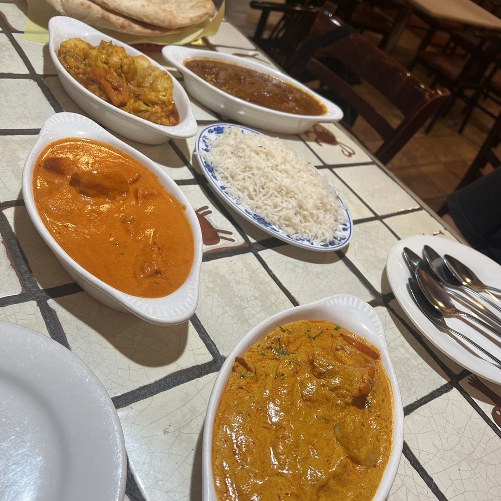 House of Curries - Naan, rice, chicken tikka masala, shrimp vindaloo, karahi gosht, and aloo ghobi - Indian Near Me - Berkeley, California