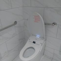 Filippo Cremonini, MD - Las Vegas Gastroenterology - High tech modern bidet type toilet that shoots warm water in your privates and dries it too.