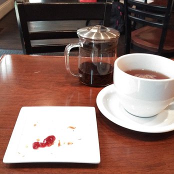 Big Dog Coffee - The croissant and jam have been devoured. Some tea remains. - Desserts Near Me - Pittsburgh, Pennsylvania Big Dog Coffee - The croissant and jam have been devoured. Some tea remains. - Desserts Near Me - Pittsburgh, Pennsylvania