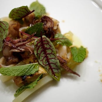 Uchiko Austin - ika yaki- fresh squid, korean pepper, green apple, sorrel, red curry, sea salt - Sushi Bars Near Me - Austin, Texas Uchiko Austin - ika yaki- fresh squid, korean pepper, green apple, sorrel, red curry, sea salt - Sushi Bars Near Me - Austin, Texas