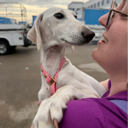 The owner with the puppy when she arrived in Houston