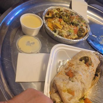 Lilia's Taqueria - A HUGE vegi burrito, Vegi nachos, & a side order of white cheese. - Mexican Near Me - Houston, Missouri Lilia's Taqueria - A HUGE vegi burrito, Vegi nachos, & a side order of white cheese. - Mexican Near Me - Houston, Missouri