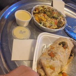 Lilia's Taqueria - A HUGE vegi burrito, Vegi nachos, & a side order of white cheese.