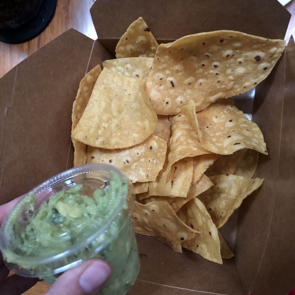 Taco Joint - Chips and guacamole to go (chips came in a paper bag and we relocated them to the box for easy eating) - Tacos Near Me - Clarksville, Maryland Taco Joint - Chips and guacamole to go (chips came in a paper bag and we relocated them to the box for easy eating) - Tacos Near Me - Clarksville, Maryland
