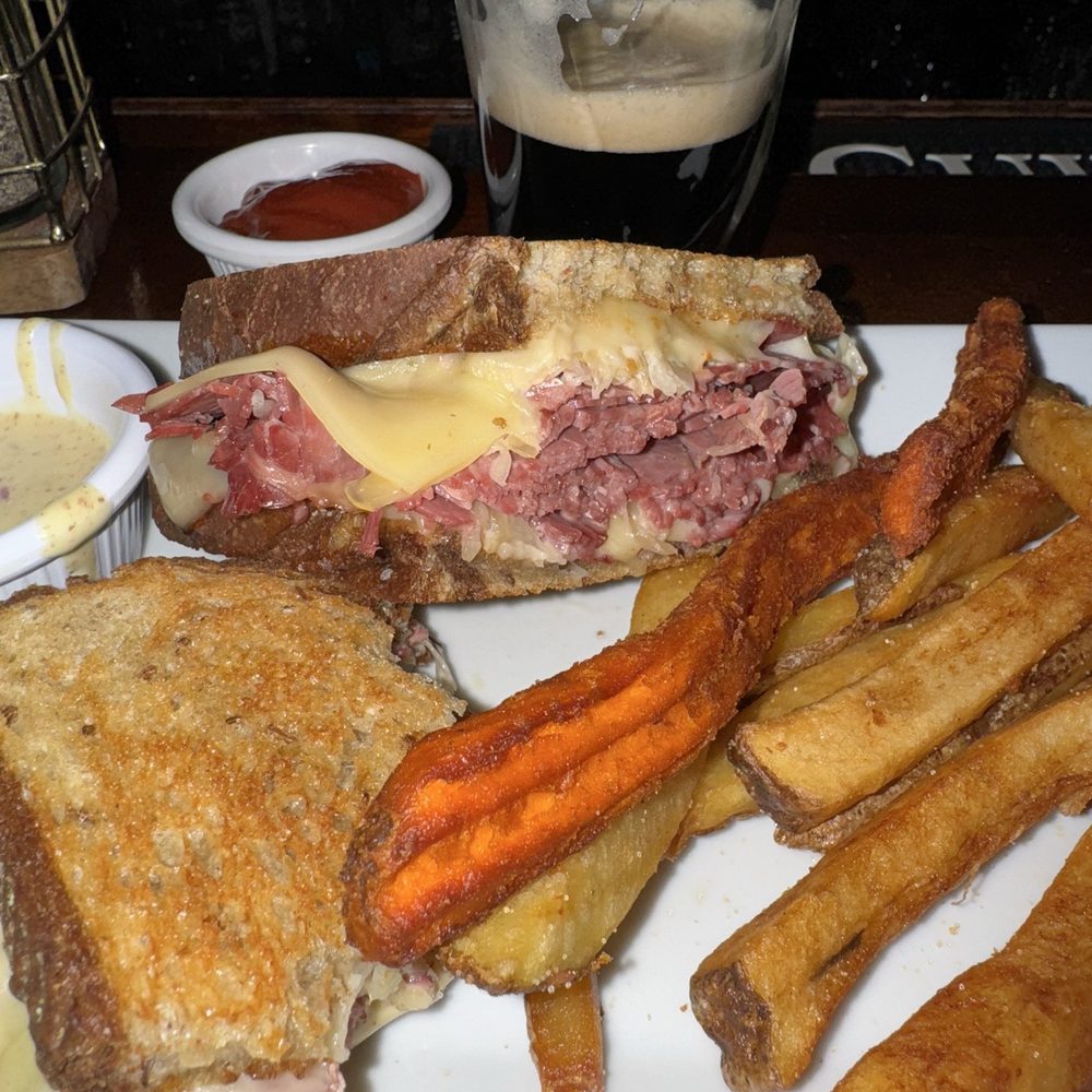 Reuben sandwich and hand-cut potato fries and sweet potato fries! Reuben sandwich and hand-cut potato fries and sweet potato fries!
