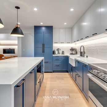 YM Designs - a kitchen with blue cabinets and stainless steel appliances - Interior Design Near Me - Mountain View, California YM Designs - a kitchen with blue cabinets and stainless steel appliances - Interior Design Near Me - Mountain View, California