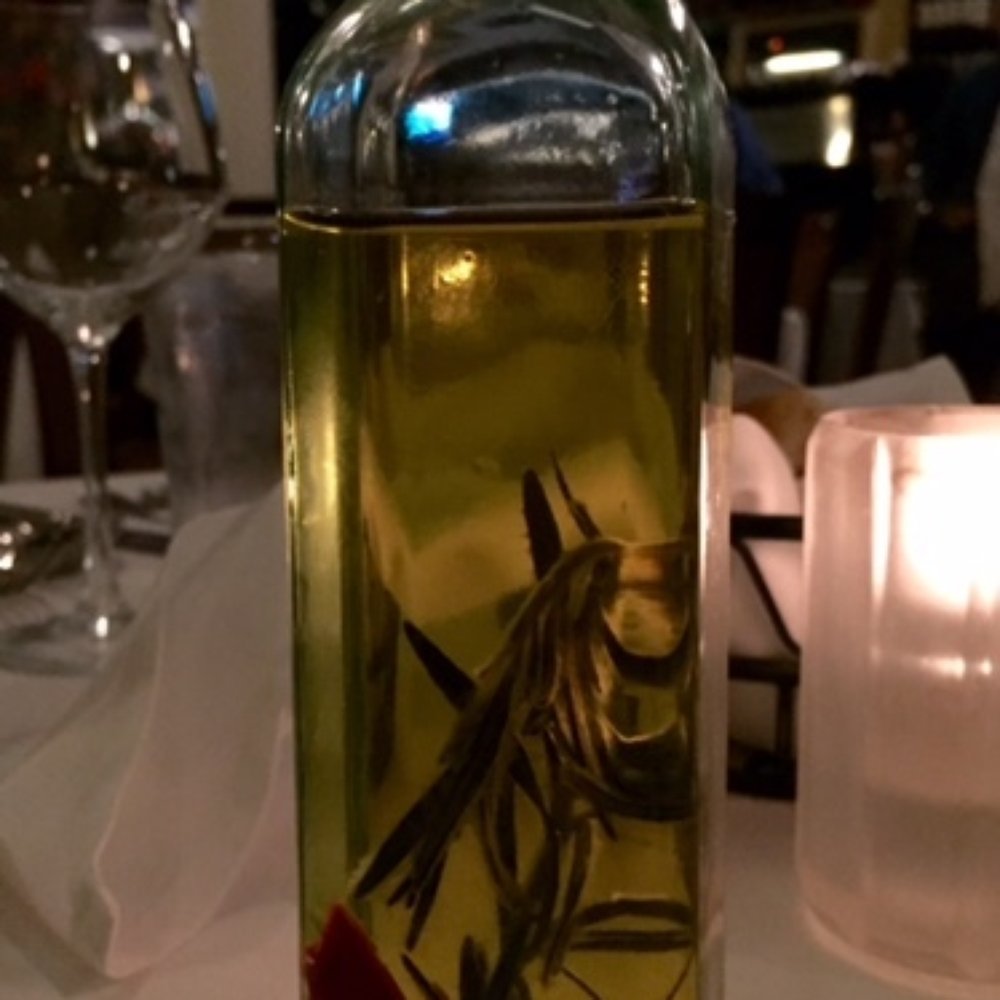 Dodici - Rosemary-infused olive oil. SO good! - Italian Near Me - Rockville Centre, New York Dodici - Rosemary-infused olive oil. SO good! - Italian Near Me - Rockville Centre, New York