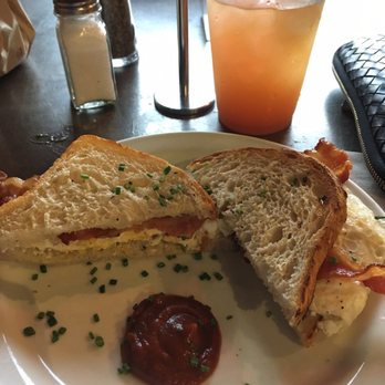 Art Is In Bakery - Breakfast sandwich of egg & bacon on white sourdough bread - Bakeries Near Me - Ottawa, Ontario Art Is In Bakery - Breakfast sandwich of egg & bacon on white sourdough bread - Bakeries Near Me - Ottawa, Ontario